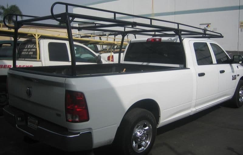 White Ram 2500 fitted with a black steel ladder rack over the bed
