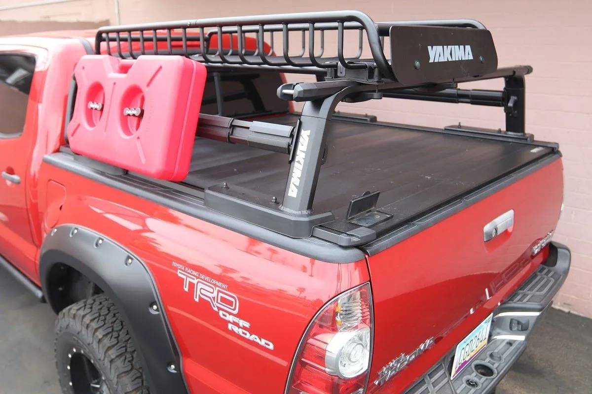 Toyota Tacoma with an aluminum bed rack mounted over a tonneau cover